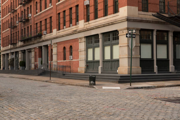 Empty Streets in Tribeca Empty sett block streets of Tribeca in New York City. street stock pictures, royalty-free photos & images