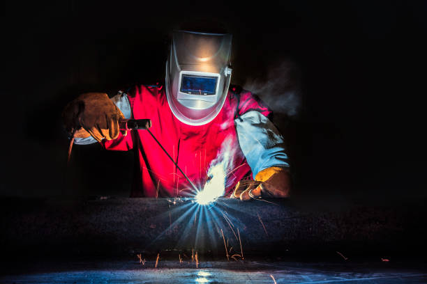 istock Welder-Worker welding and cutting steel in workshop of construction site with Oxy-Propane cutting and welding to steel part by manual 1333681512
