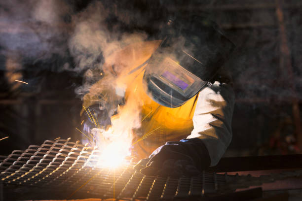 istock Welder-Worker welding and cutting steel in workshop of construction site with Oxy-Propane cutting and welding to steel part by manual 1333681538
