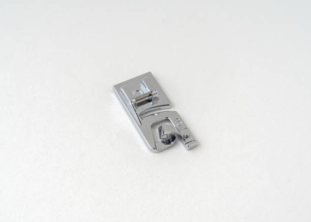 istock Presser foot portable sewing machine isolated on white background. 1333692904