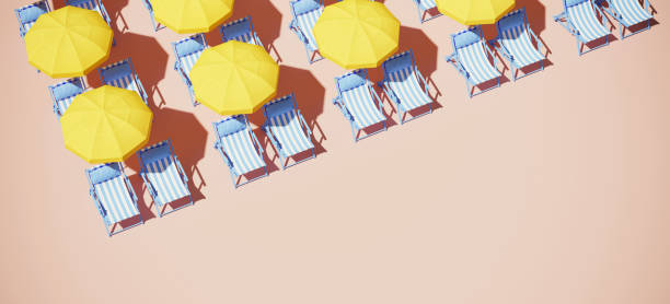 istock Yellow beach umbrella and blue stripe pattern sun lounger on sand, 3d render Stock Picture 1333694057