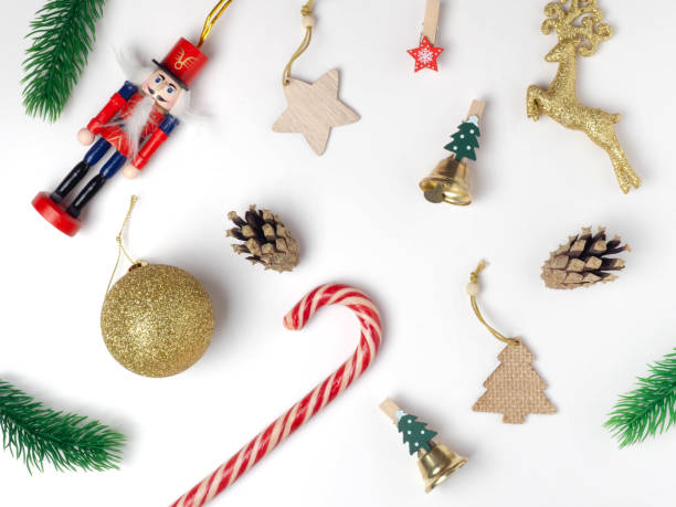 istock Christmas holiday background with board and decorations, gift boxes on the gray textured board View from above 1333694675
