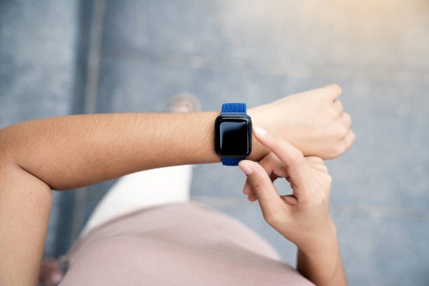 closeup hand using smartwatch on above view stock photo