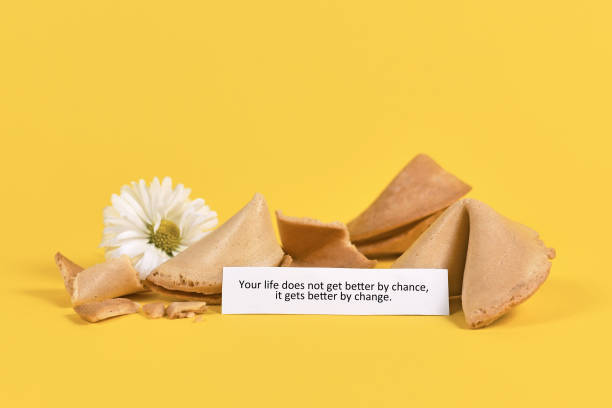 istock Note in fortune cookie saying 'Your life does not get better by chance, it gets better by change' 1333695851