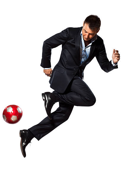 istock one business man playing juggling soccer ball 133369647