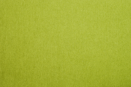 Yellow-green cotton chenille woven material.