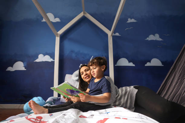 istock A mother reading to her four-year-old son. 1333703591
