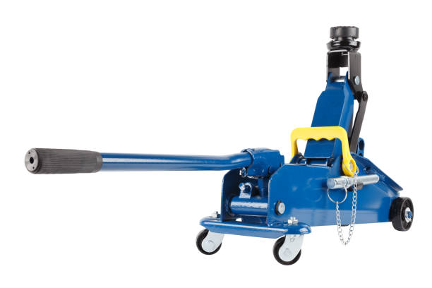 istock blue hydraulic car jack isolated on white background, rised up 1333705740
