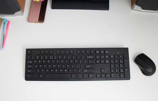 The desktop computer of a student. Monitor with the white screen background