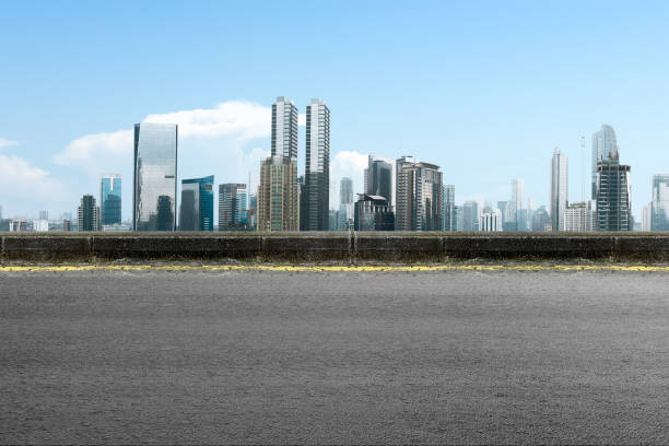 istock Asphalt road with modern building and skyscrapers 1333713791