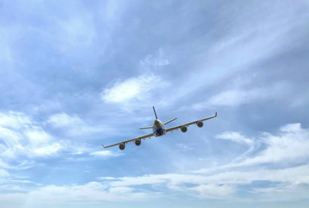 istock travel on the airplane, plane fly in the sky 1333714752