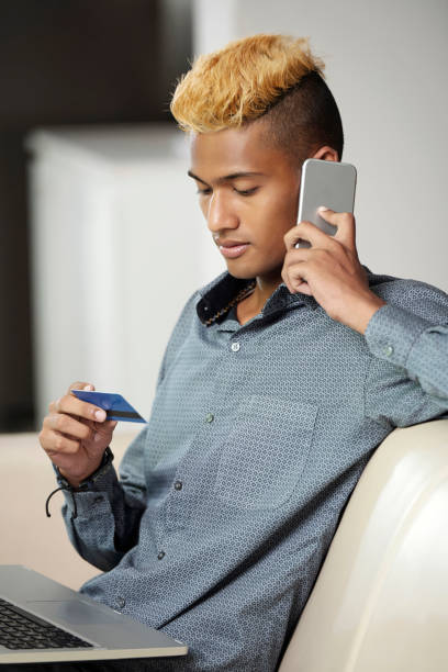 istock Man Talking on Phone with Bank Manager 1333715414
