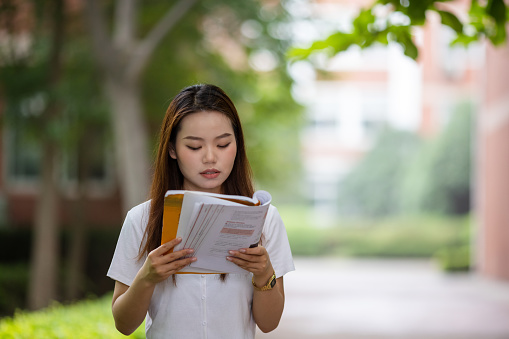 College students reading on campus
