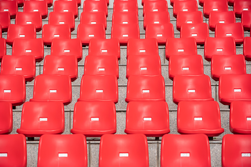 Red chairs of the stadium