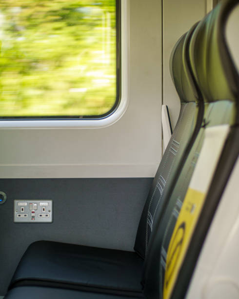 istock Seats on the train with green outside the window 1333728445