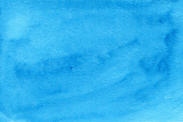 istock Turquoise abstract watercolor background on textured paper 1333730129