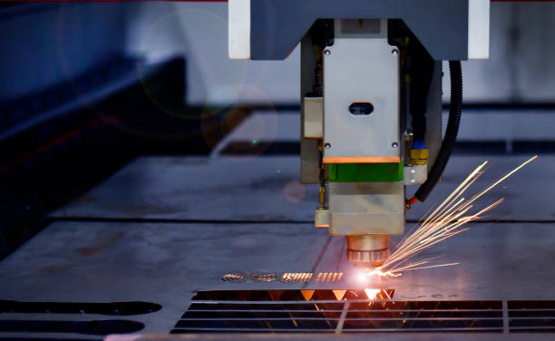 istock Industrial laser cut machine while cutting the sheet metal 1333731269