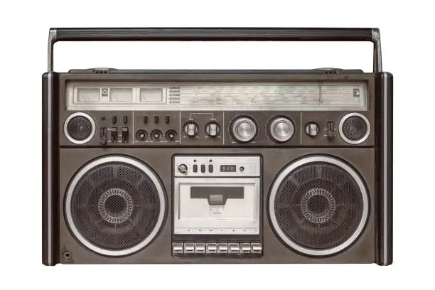 Old radio AM FM front face cassette tape player isolated on white background with clipping path.