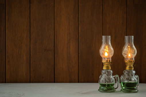 a vintage oil lamp on the table