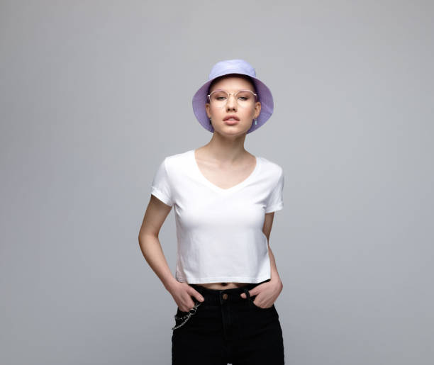 istock Confident young woman with lilac bucket hat 1333738866