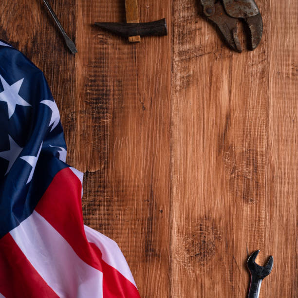 istock Top view design concept of Labor Day with working tools and jeans. 1333741993