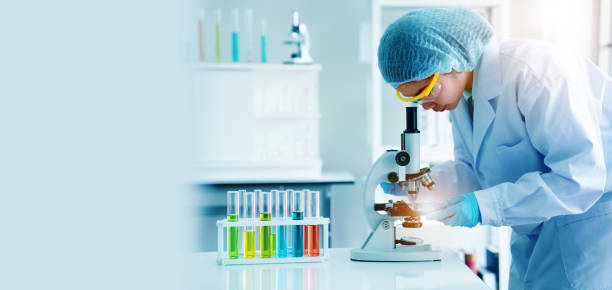 istock Asian scientist or doctors use microscopes to test for the coronavirus (COVID 19). Or a new flu virus to save human life In the lab Or hospital. Successful in researching the treatment of patients 1333743808