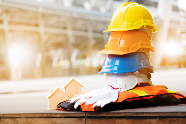istock Safety Construction Worker Hats Blue, white, yellow, orange. Teamwork of construction team must have quality. Whether it engineer, construction workers. Have a helmet to wear at work. Safety at work.
1205863144

Safety Construction Worker Hats Blue, white 1333743902