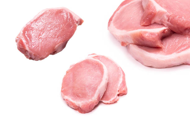 istock Raw pork pieces isolated on a white background. 1333746119