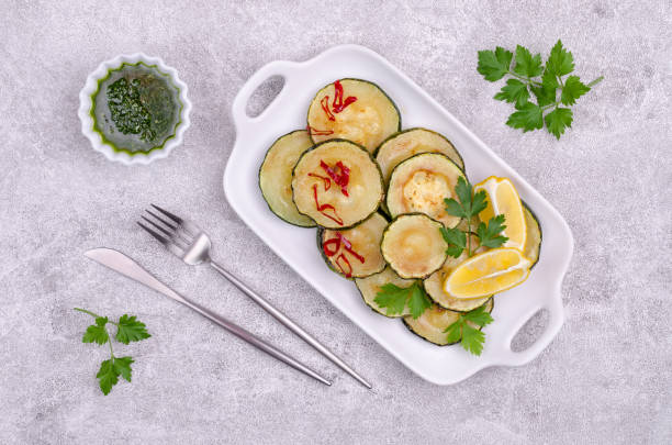 istock Fried zucchini with green sauce 1333748135