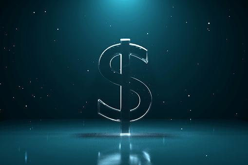 American dollar sign on the abstract futuristic dark background. Stock market and finance concept