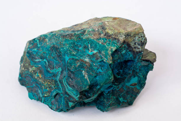 istock copper ore from a copper mine in Chile, a green stone on a white background. 1333751788