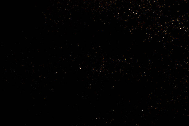istock Golden abstract bokeh on black background. 1333752744