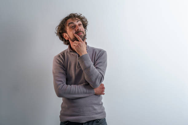 istock Business man in casual clothes on a neutral background. 1333753619