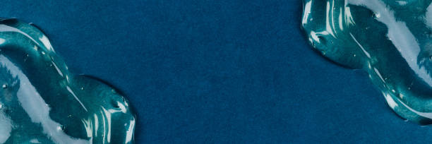 istock Transparent hyaluronic acid gel on a blue background. 1333753748