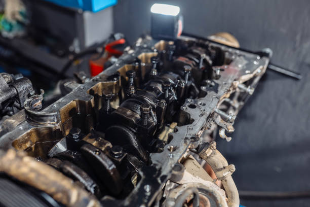 istock engine repair, open valve cover, camshaft repair, chain replacement. 1333756079