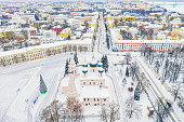 Aerial drone view of Orthodox Church of Elijah the Prophet and old city center in winter of Yaroslavl, Russia. Ancient russian city of the touristic Golden Ring.