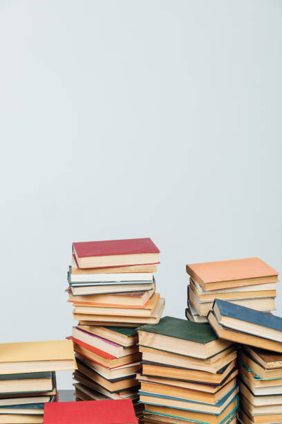 istock Stacks of books for teaching knowledge of the college university library white background 1333756637