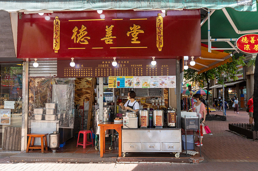 Hong Kong - August 12, 2021 : Vendor at the Chinese herbal tea store in Yuen Long, New Territories, Hong Kong.