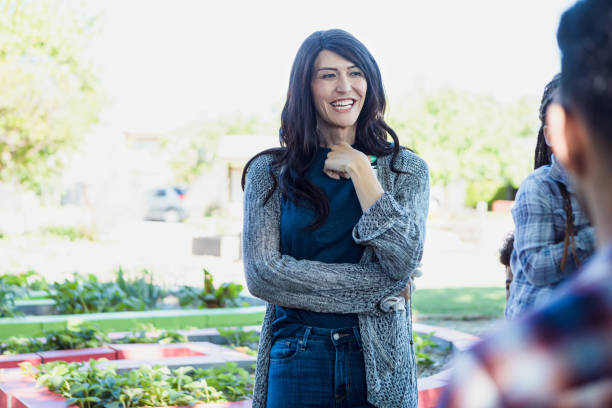istock Elementary school teacher smiles at start of field trip 1333762881