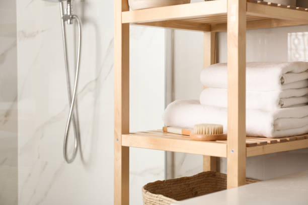 istock Shelving unit with clean towels in bathroom interior 1333767768