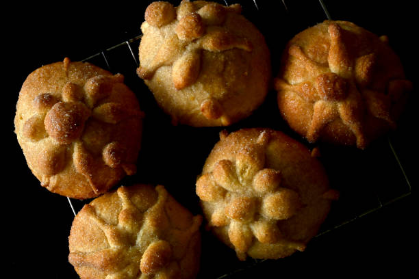 istock Overhead of traditional pan de muerto set on baking rack 1333767915