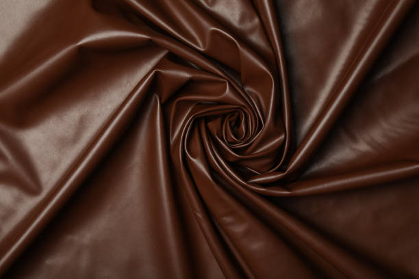 istock Piece of crumpled leather as background, top view 1333768138