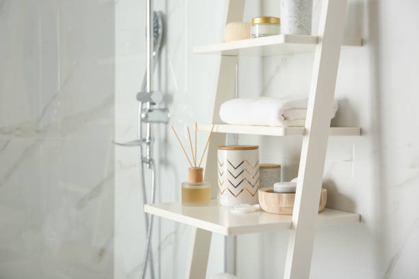 shelving unit with different items in bathroom interior - beautiful decor shower design imagens e fotografias de stock