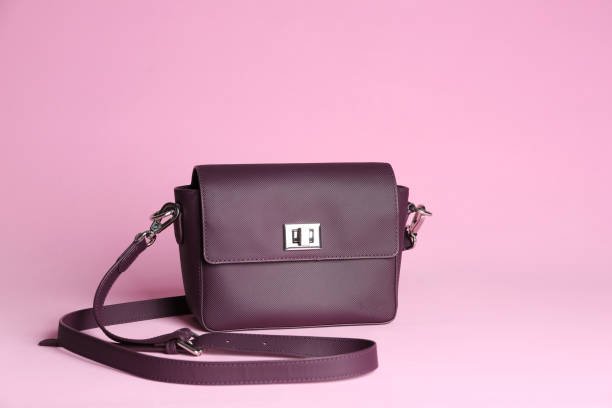 istock Stylish woman's bag on light pink background 1333768223