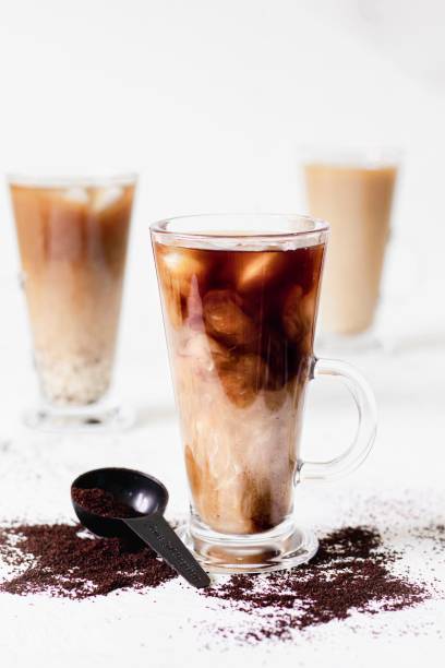 White Iced coffees in tall latte glass cups stock photo