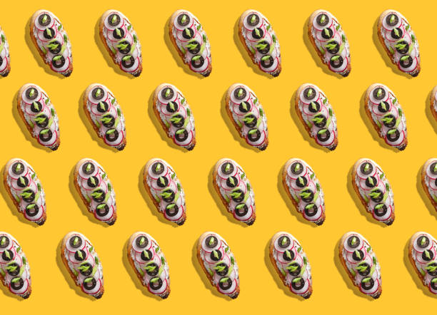 istock A pattern of various sandwiches on a yellow background 1333773972