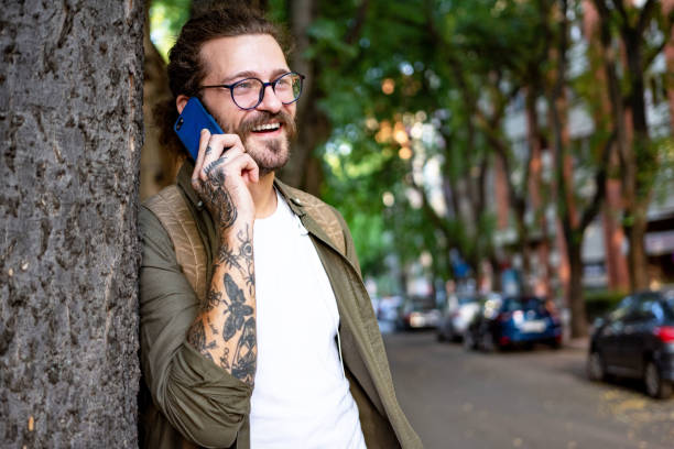 istock Young man talking on his phone 1333775433
