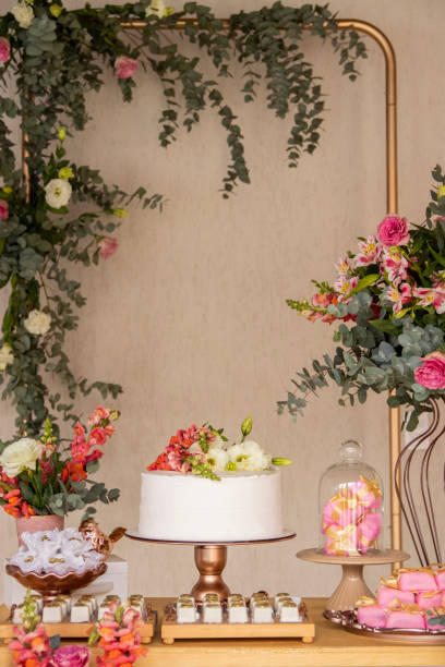 istock Wedding Setup. Cake table with sweet, decoration and flowers 1333777267
