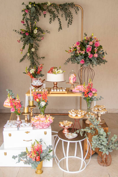 istock Wedding Setup. Cake table with sweet, decoration and flowers 1333777330