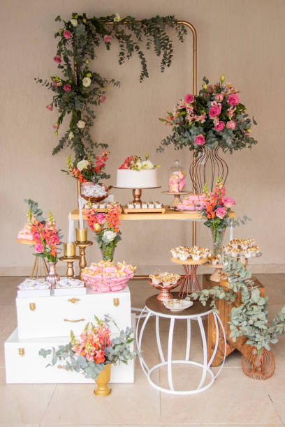 istock Wedding Setup. Cake table with sweet, decoration and flowers 1333777449